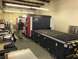 High Precision Laser Cutter - Guzman Manufacturing, Inc.